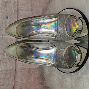 Speed Limit 98 silver platform heels